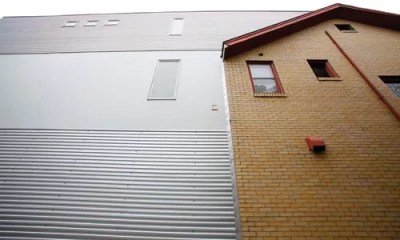 An artful addition appends an artist’s studio to a traditional Pittsburgh house.