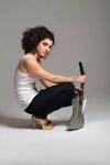 Carrie Rodriguez and her mandobird swoop down on Rex Theater