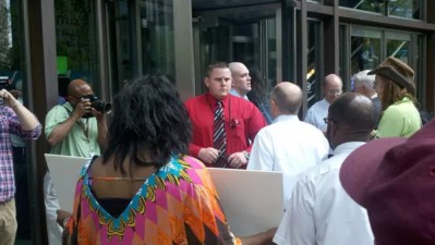 Protesters try to give UPMC its Tax Bill