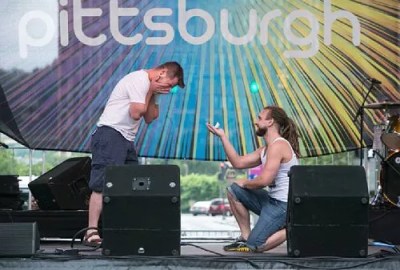 Surprise Marriage Proposal Onstage at PrideFest