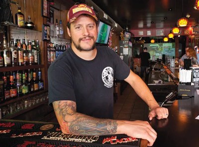 After a long journey, Smiling Moose owner Mike Scarlatelli celebrates 10 years with a grin