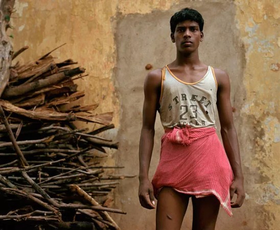 Local photographers document the aftermath of an attack on an Indian village.