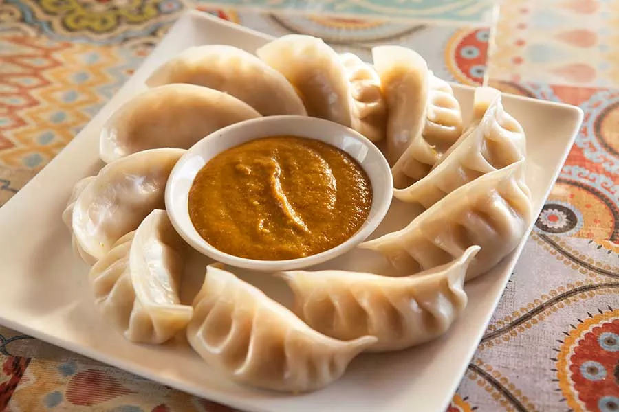 momo-dumplings-with-himalayan-sauce.webp