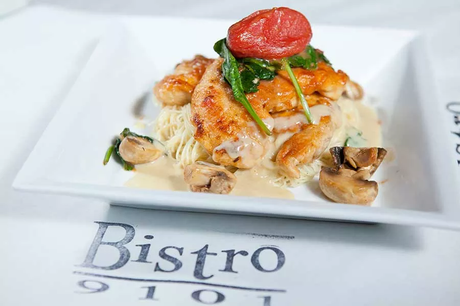 paillard-of-chicken-over-capellini_-in-white-white-buerre-blanc_-with-mushrooms_.webp