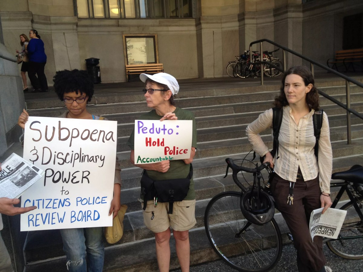 Protesters turn out for city’s opening case in police contract arbitration