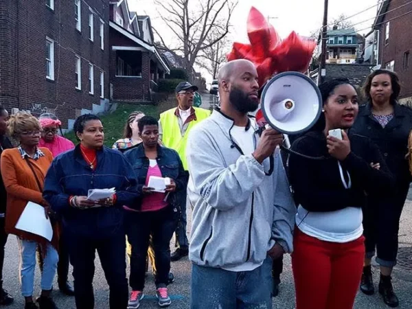 Pittsburgh-area residents revisit scene of last week’s mass shooting in Wilkinsburg