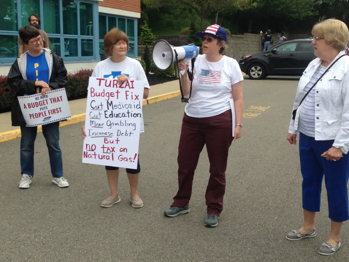 Protesters and North Hills constituents rally outside of Pennsylvania House Speaker Mike Turzai’s office, ask for a solution to balance the state budget