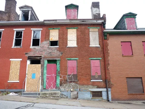 Speculators have been holding onto hundreds of properties in Uptown for years. What does that mean for the neighborhood’s future?