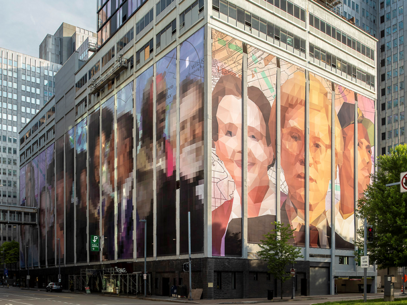 Andy Warhol, Roberto Clemente, and others tower over Downtown for We Are Pittsburgh public art project