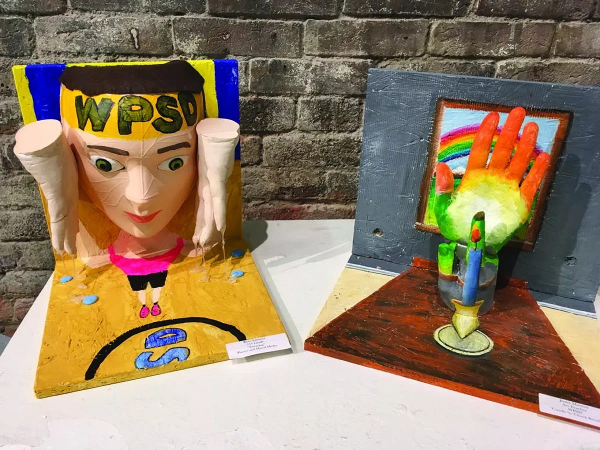 De’VIA works to create ASL term for Andy Warhol as part of deaf art education workshop