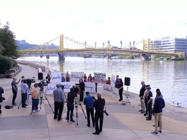 Stones and Roses features photography and paintings of two of Pittsburgh’s worst tragedies to emphasize the importance of community