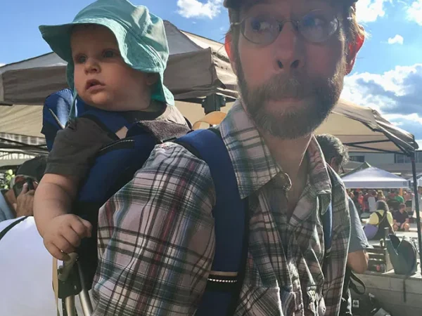 Poet Kristofer Collins works best at bars with an aesthetically pleasing beer in front of him