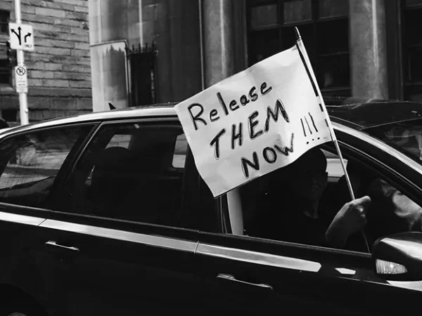 Drive-by protesters call for more releases of inmates at Allegheny County Jail, state prisons