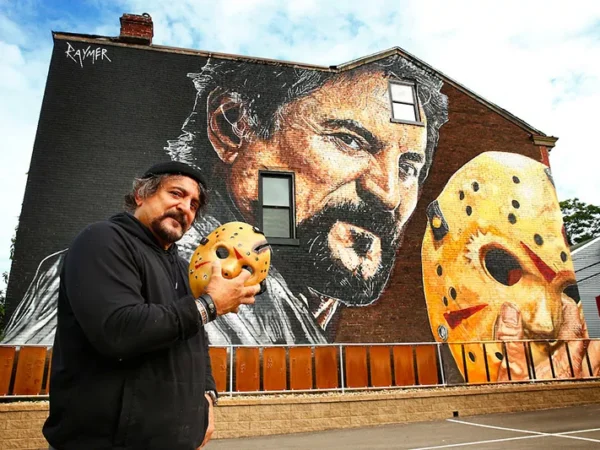 Artist Jeremy Raymer brings larger-than-life mural of Pittsburgh’s own horror king Tom Savini to Lawrenceville