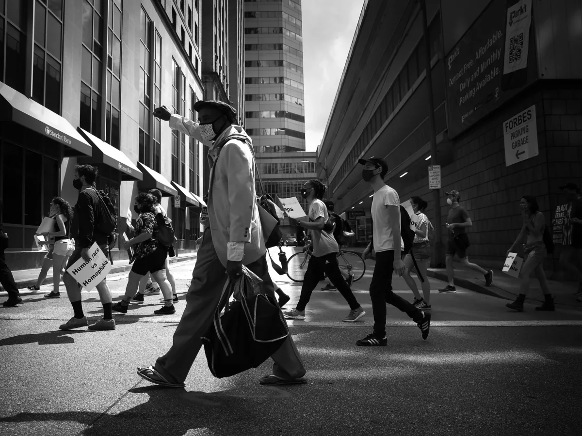 PHOTOS: More than 100 protest in Pittsburgh against Trump’s trans policy reversals