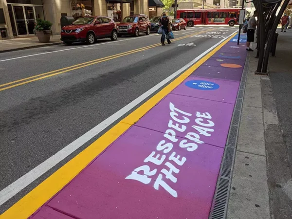 Downtown Pittsburgh bus stop reopens with “Respect the Space” art installation by Janel Young