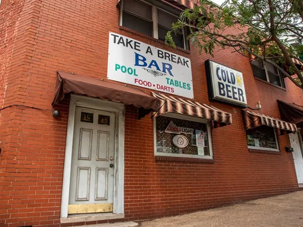 Lawrenceville dive Take a Break Bar — and its attached duplex — is up for sale