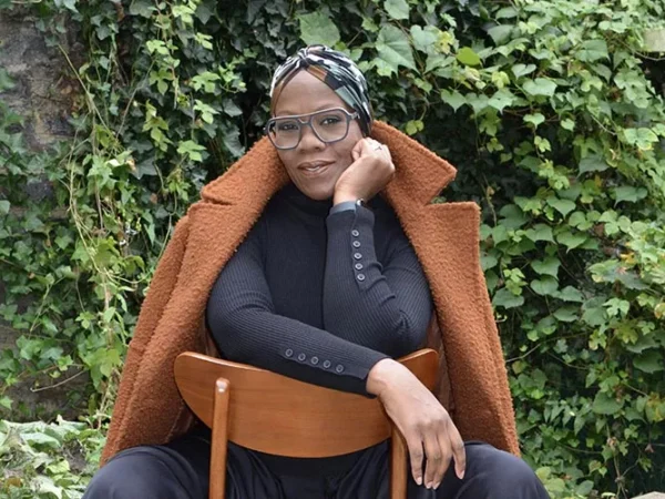 FashionAFRICANA founder Demeatria Boccella loves on UGG slippers and Haute Couture