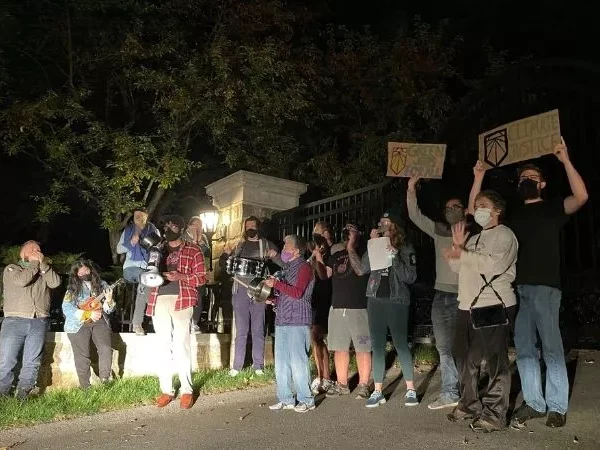 Activists rally outside Sewickley home of Sen. Joe Manchin’s daughter in support of reconciliation bill