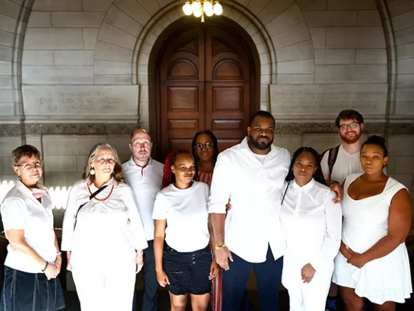 Court watchers wear white at probation hearing to protest judge’s conduct