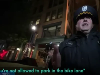 Video shows police officer belittling resident when confronted on illegal parking