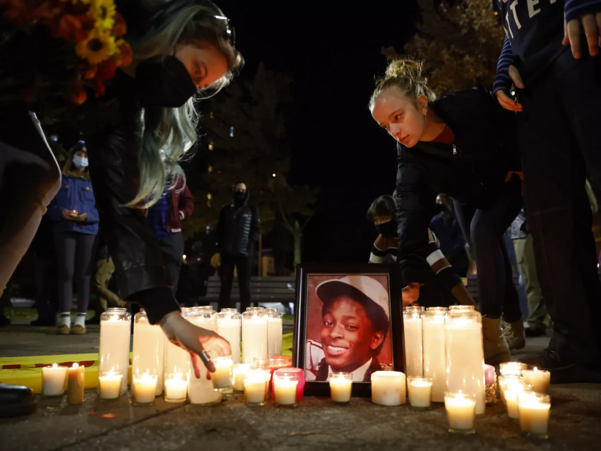 Community members honor Jim Rogers with candlelight vigil on anniversary of his death