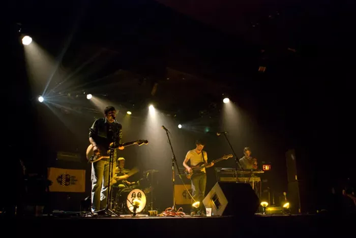 A band plays on a stage