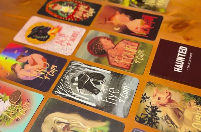 Rows of colorful tarot cards feature illustrations of different folklore from the Appalachian region.