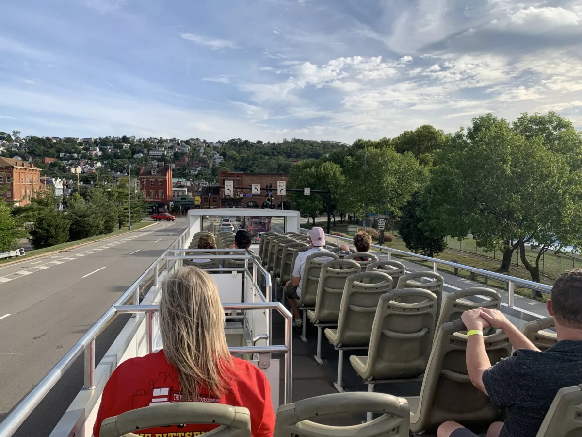 The Pittsburgh Tour Company’s big red busses pair tourism with close looks at local history