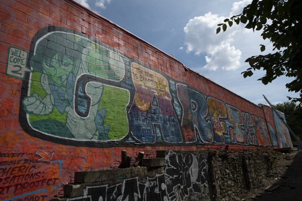 A large mural reading GARFIELD with images inside each letter